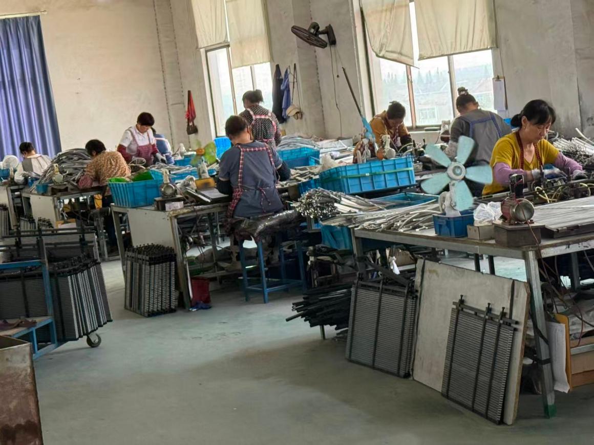 Production workshop assembling PTC aluminum corrugated heat dissipation strips